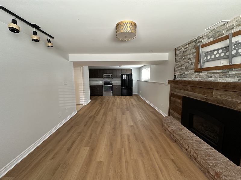 WELL MAINTAINED LOWER LEVEL SUITE ON A QUIET COURT