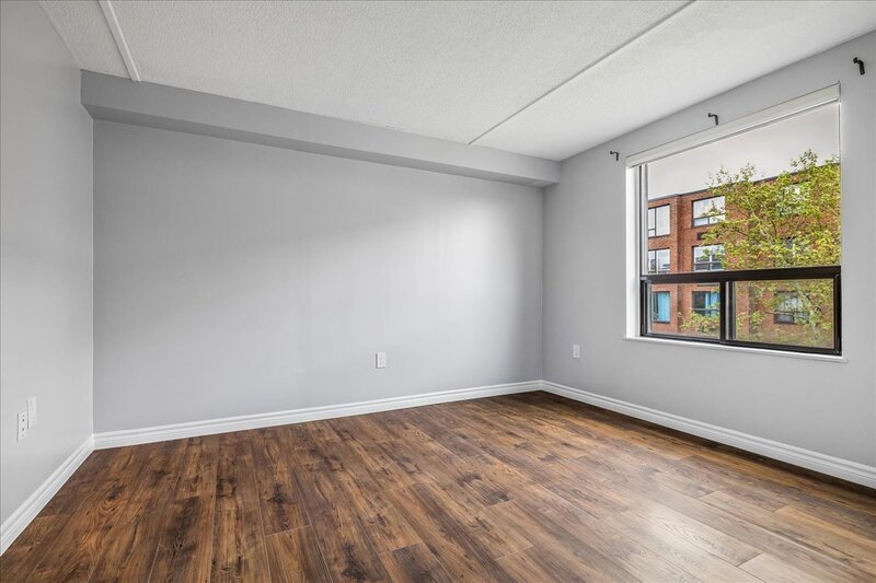 LARGE UNIT IN QUIET STONEY CREEK BUILDING!