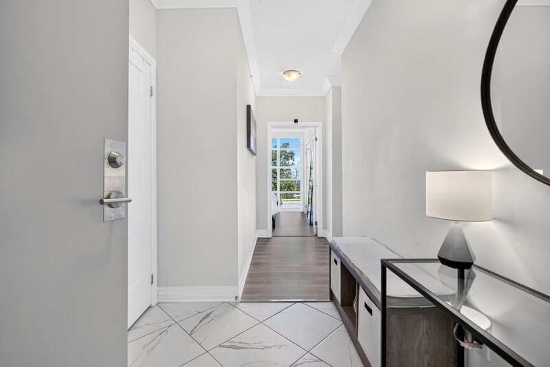 2 UNDERGROUND PARKING SPACES & LAKE VIEWS IN SOUGHT AFTER GRIMSBY NEIGHBOURHOOD