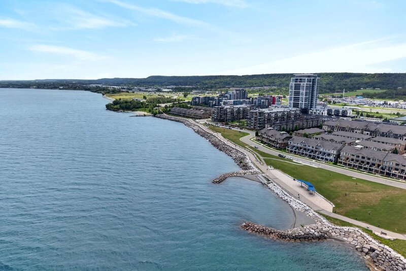 AMAZING VIEWS IN THIS GORGEOUS GRIMSBY 1BR+DEN CONDO
