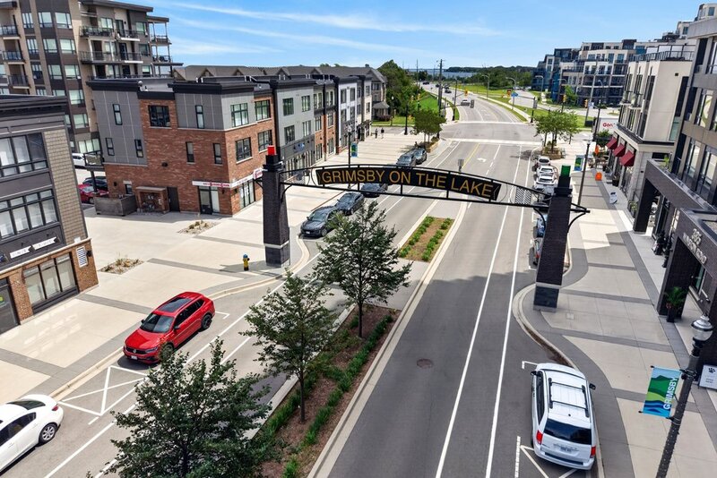 AMAZING VIEWS IN THIS GORGEOUS GRIMSBY 1BR+DEN CONDO